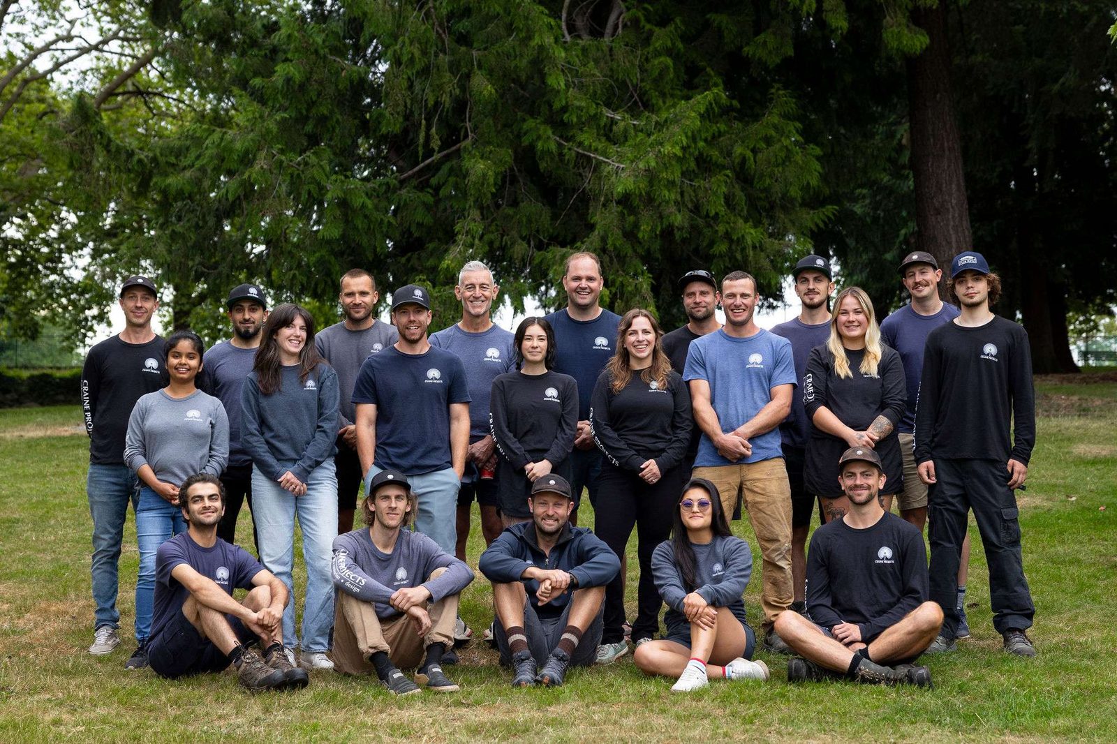 The Craine Projects team in matching branded gear