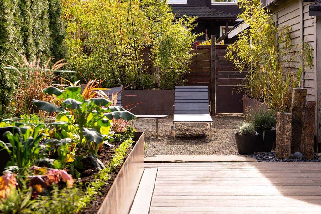 Zen garden with deck by Craine Projects